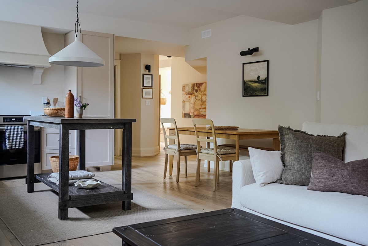 Warm open living and dining room at The Alton Landing